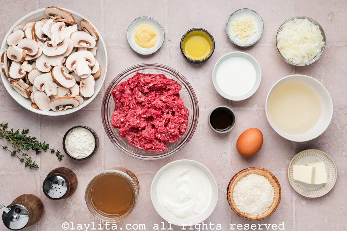 Ingredients needed to make beef stroganoff meatballs on a kitchen counter.