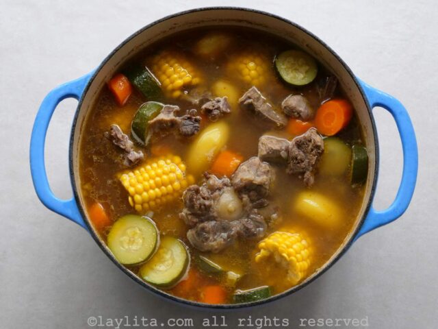 Overhead shot of a large Dutch oven pot of caldo de res.