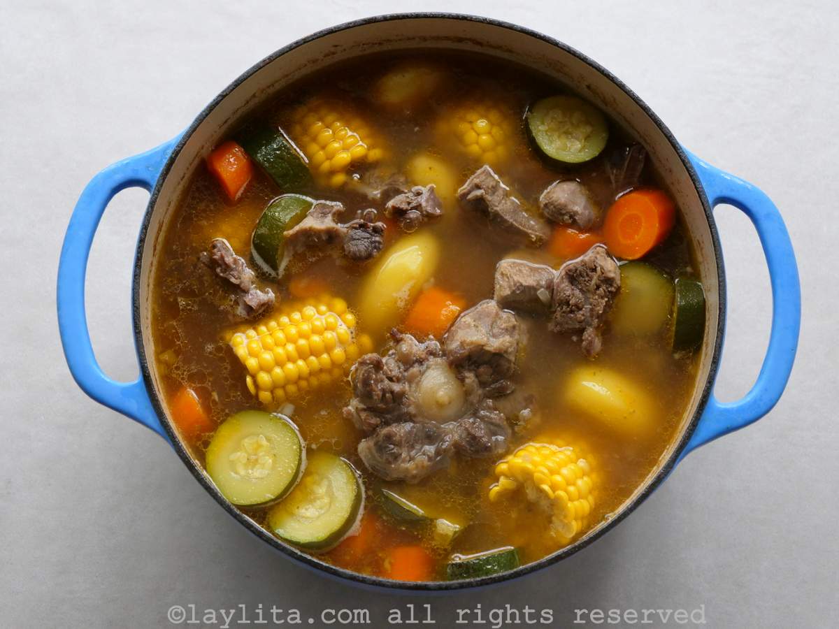 Overhead shot of a large Dutch oven pot of caldo de res.