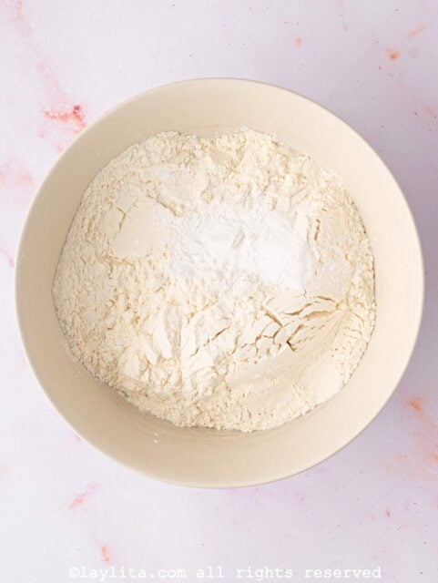 Flour, baking powder, baking soda, and salt in a large mixing bowl