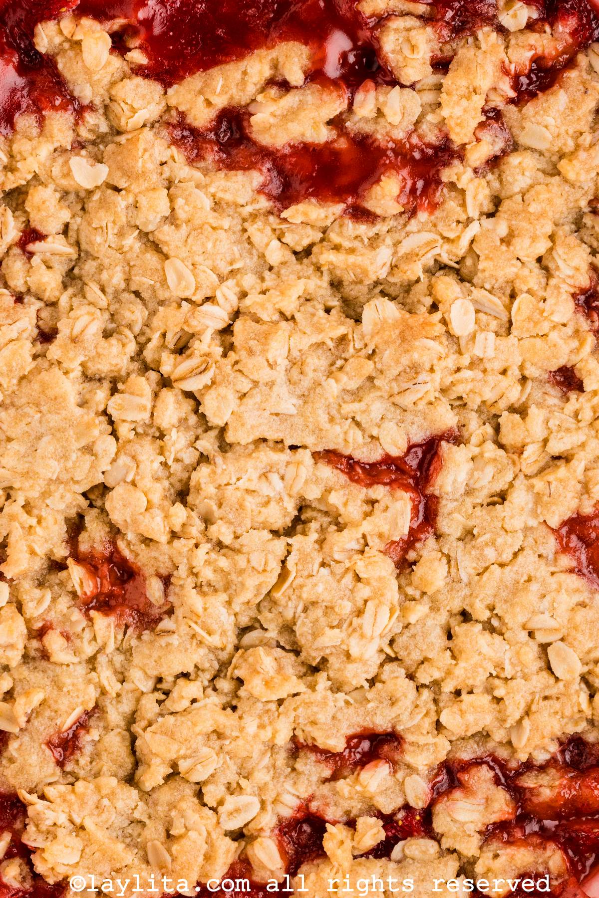 Closeup of the oat topping on a strawberry crisp