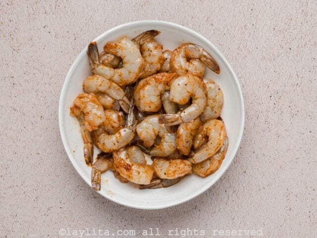Seasoned shrimp in a white bowl