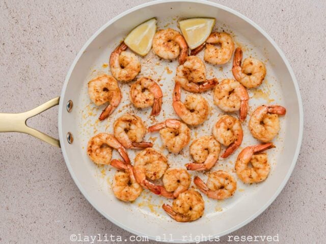 Shrimp cooking in a skillet