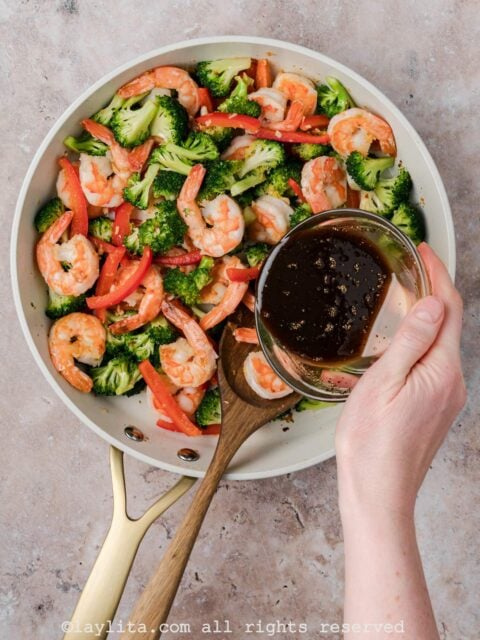 Add the stir fry sauce to the veggies and shrimp