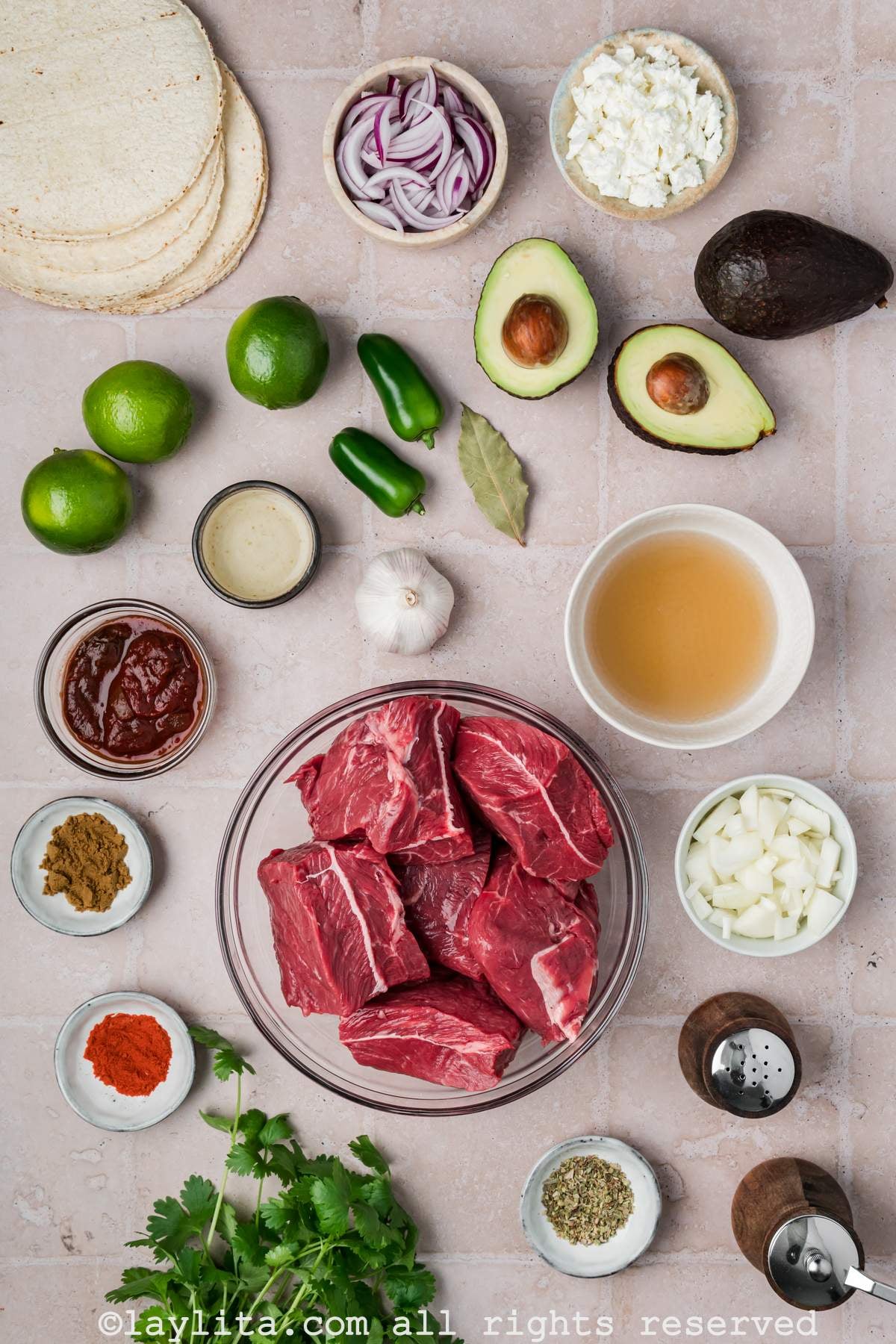 Ingredients for Beef Barbacoa Tacos on a kitchen counter