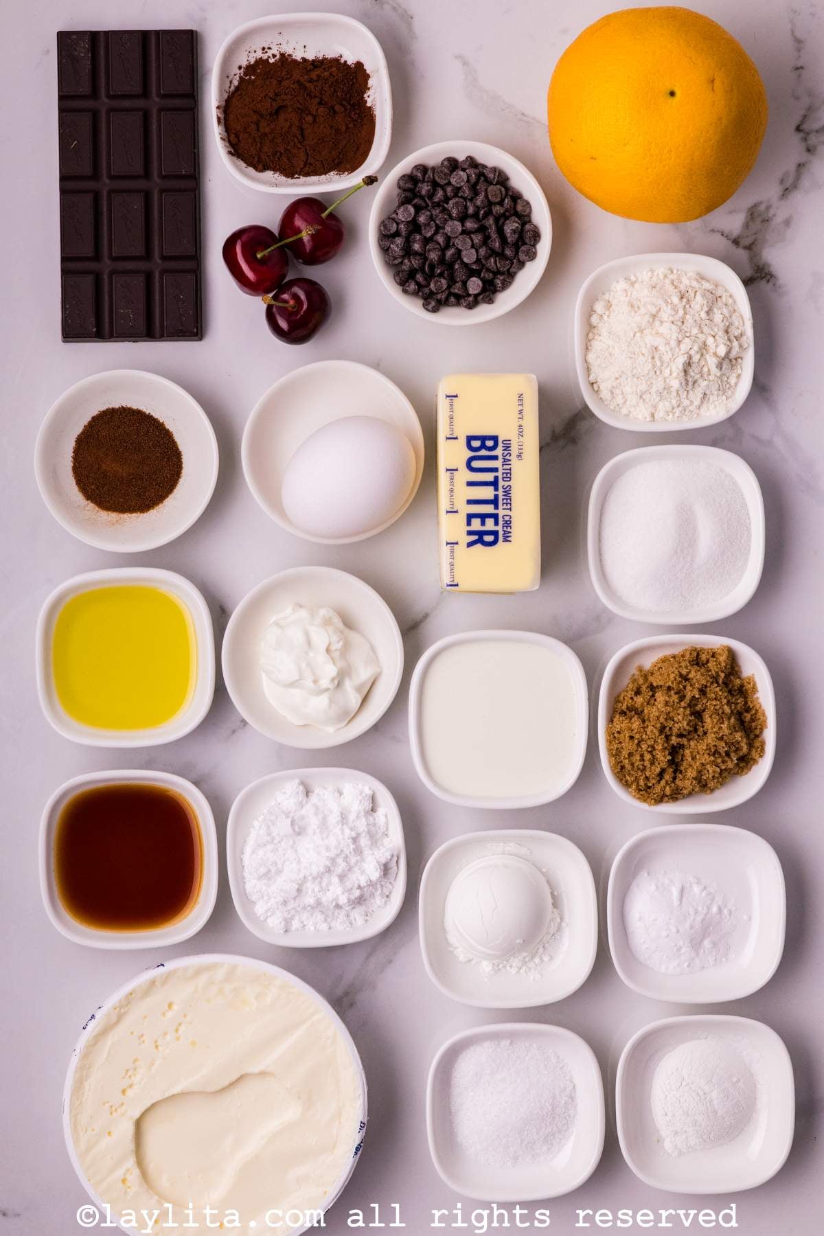 Ingredients measured out for Chocolate Cherry Black Forest Cake recipe on a kitchen counter