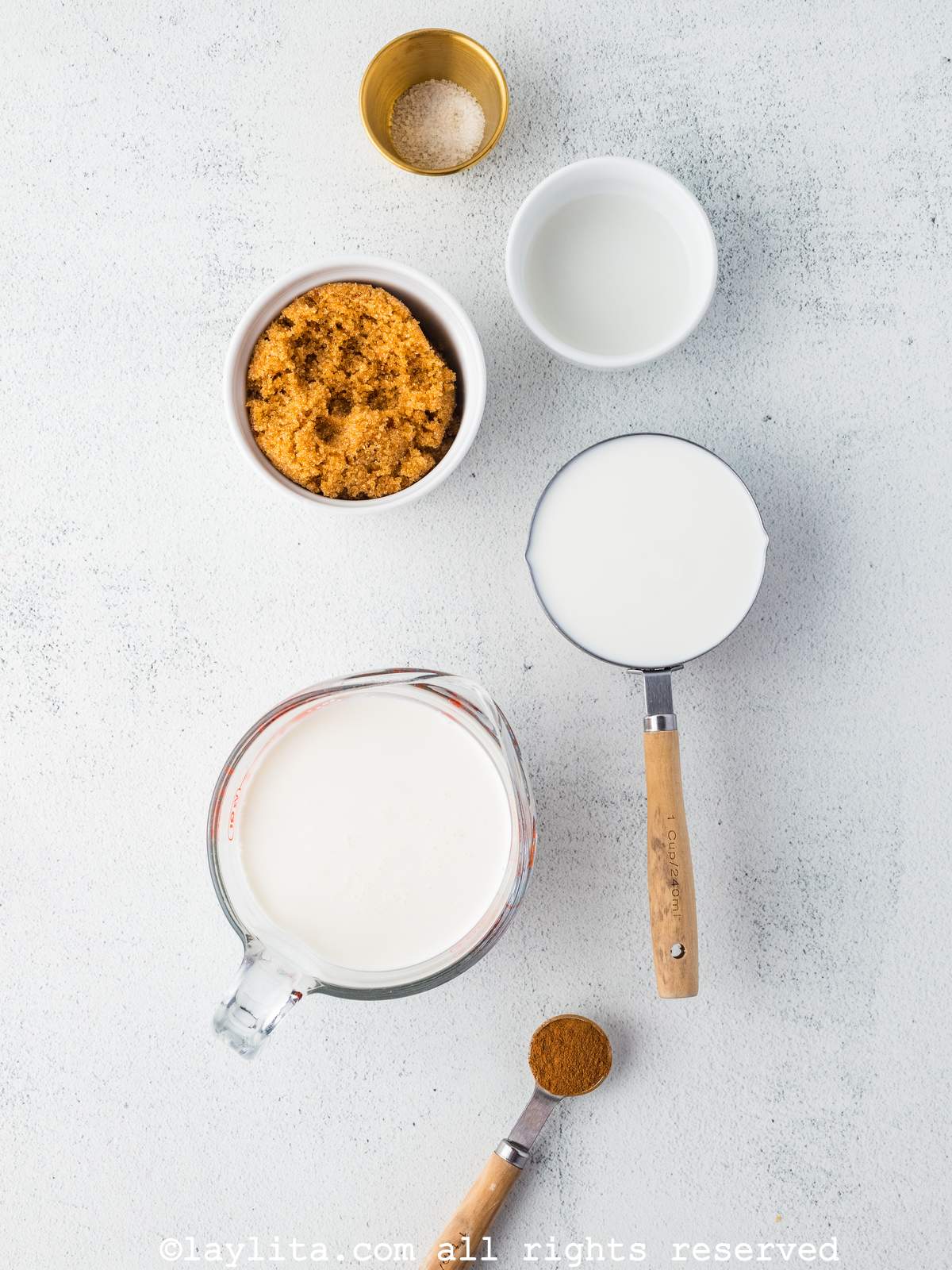 Ingredients for Cinnamon Ice Cream or Helado de Canela on a white countertop