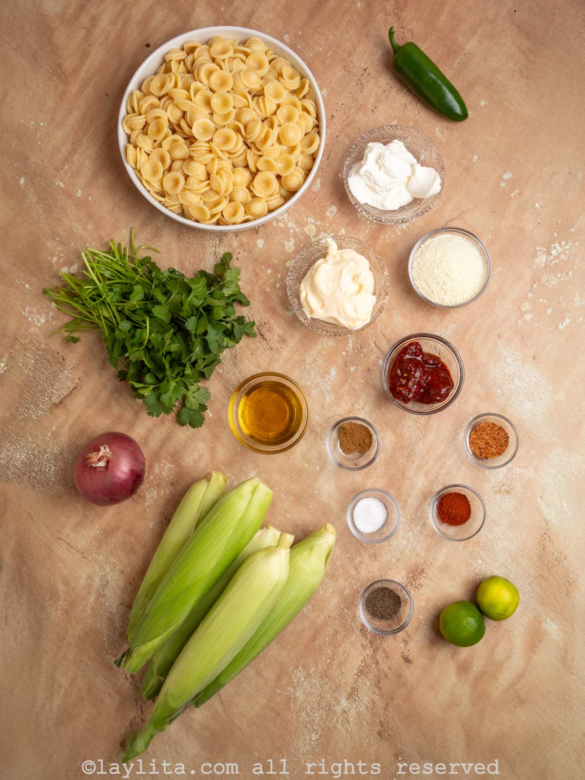 Ingredients for Mexican Street Corn Pasta Salad on a kitchen counter