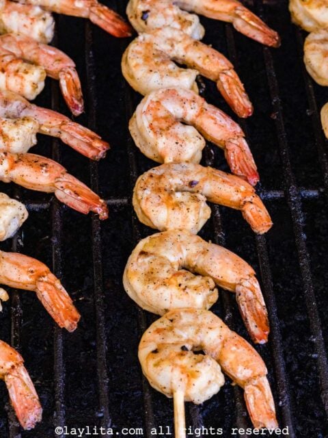 Shrimp cooking on a grill