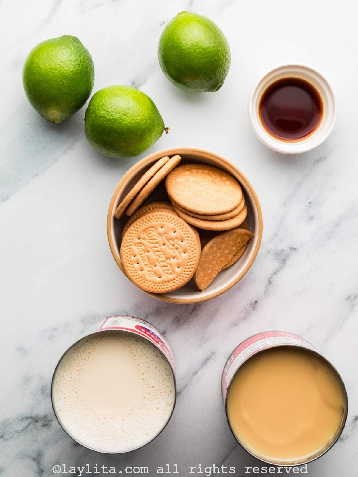 Ingredients needed to make carlota de limon on a counter