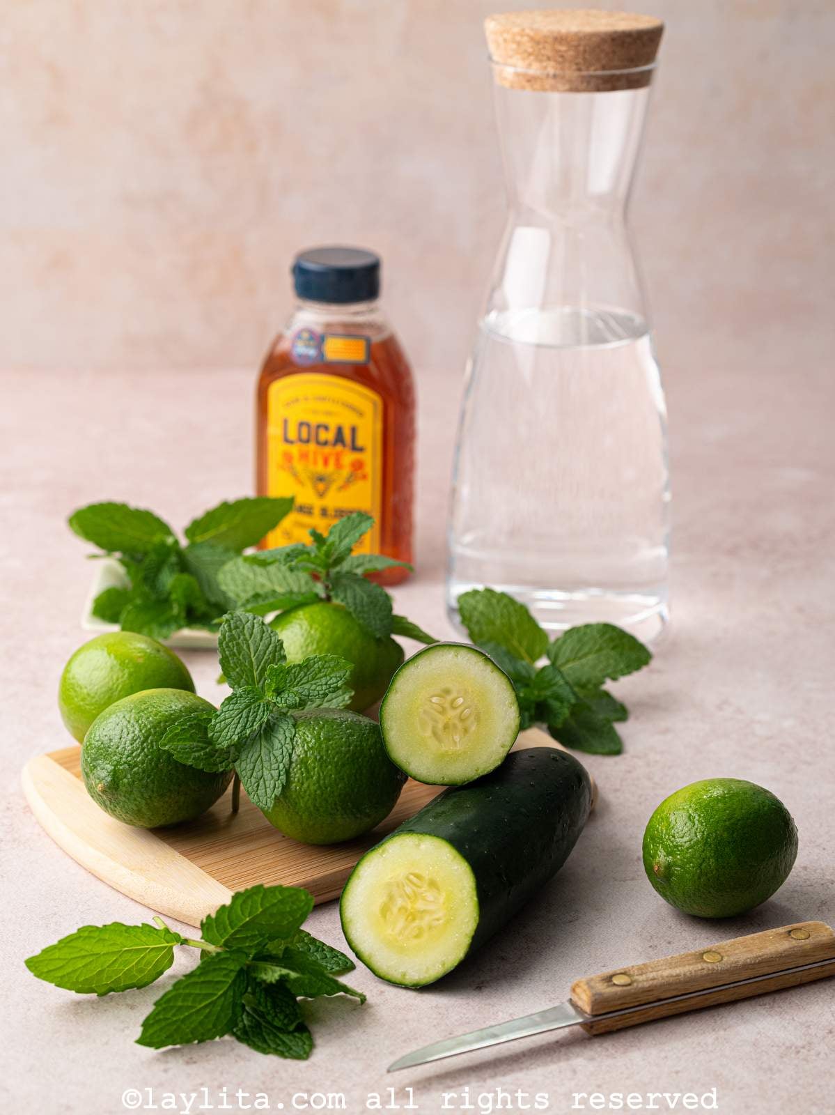 Ingredients for Cucumber Mint Agua Fresca Cooler on a kitchen counter