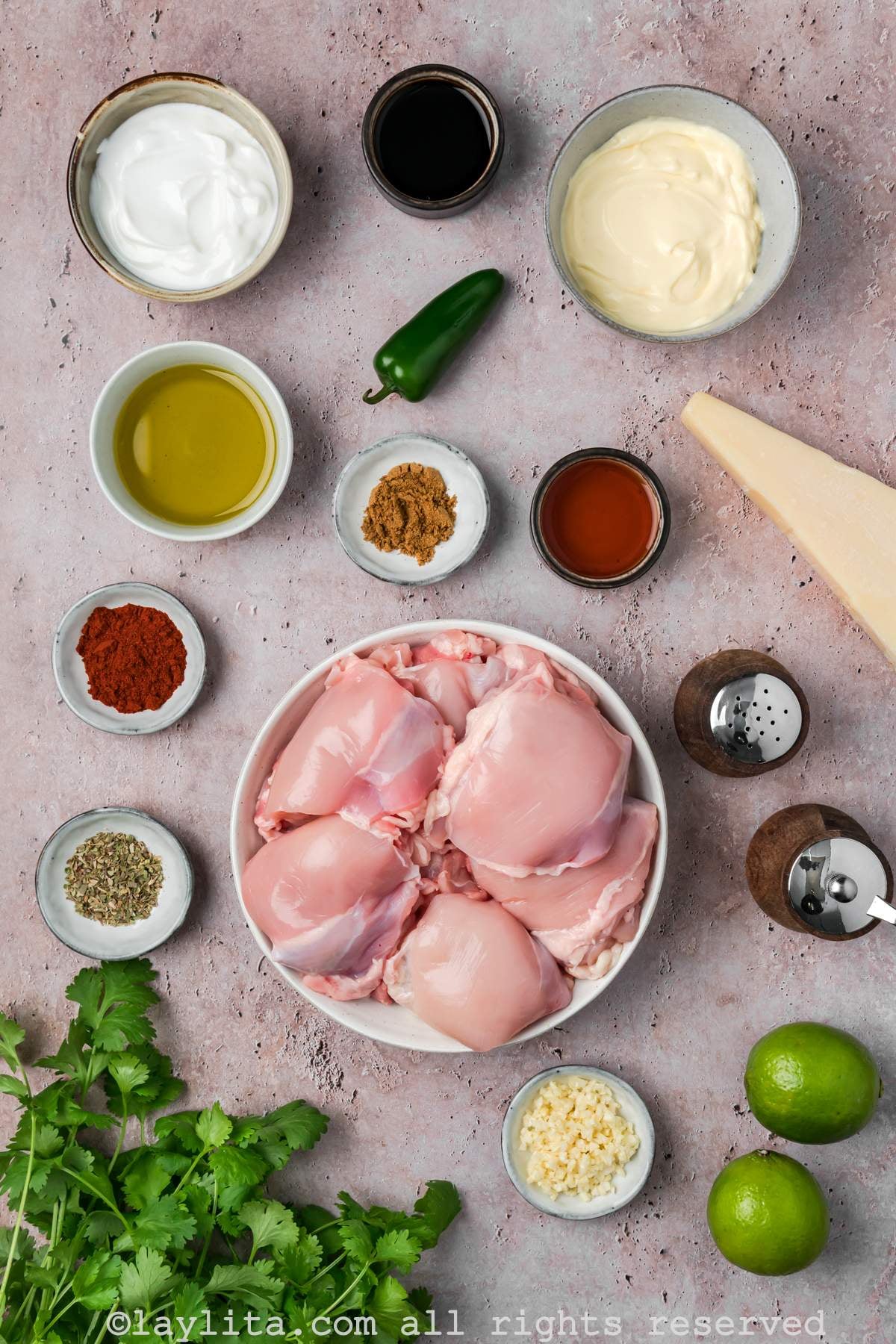 Ingredients needed to make Peruvian chicken thighs and green ají sauce