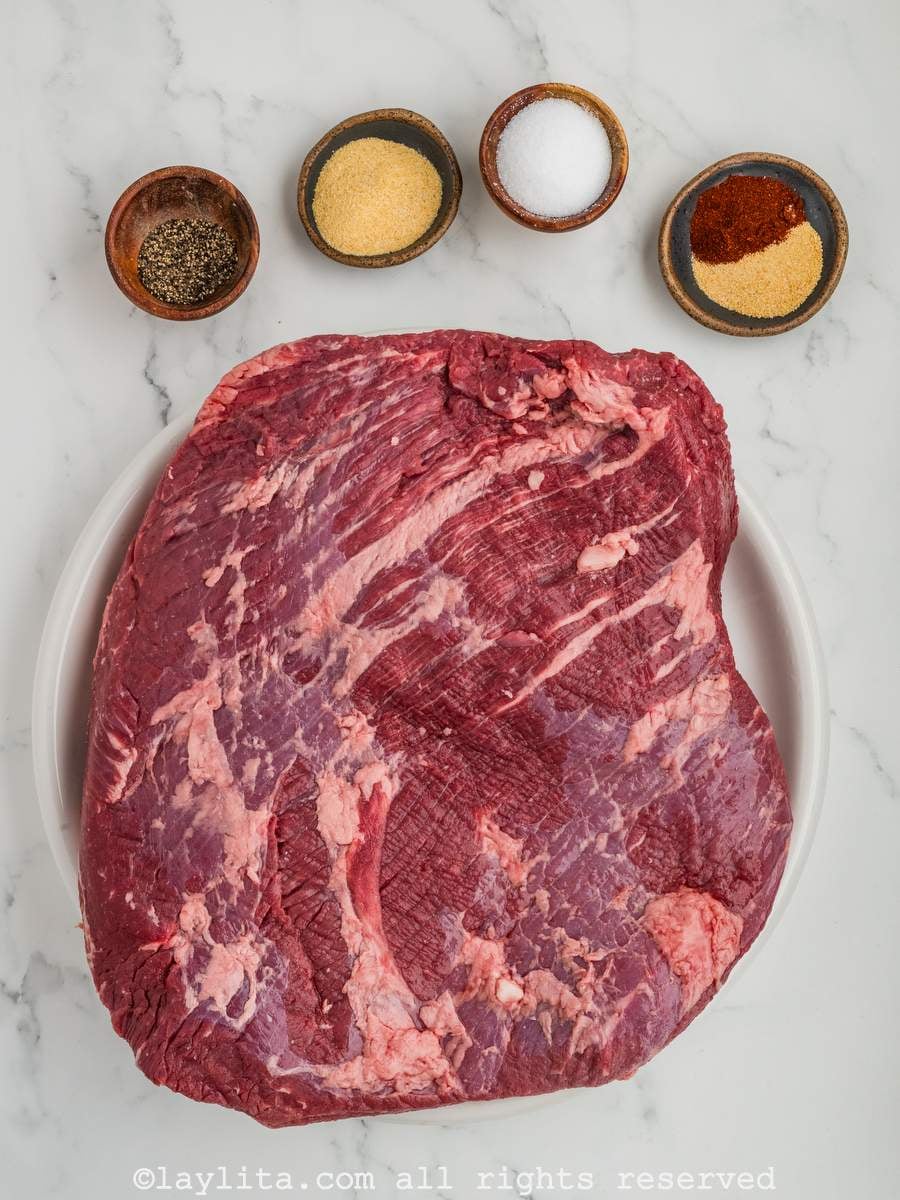 Ingredients needed to make smoked brisket on a counter