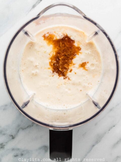 Lime juice, evaporated milk, sweetened condensed milk, and vanilla in a blender