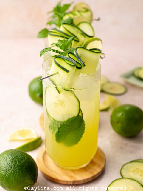 Serve the Cucumber Mint Agua Fresca Cooler garnished with slices of cucumber and mint leaves