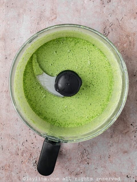 Preparation for Peruvian Green Sauce or Ají Verde in a food processor