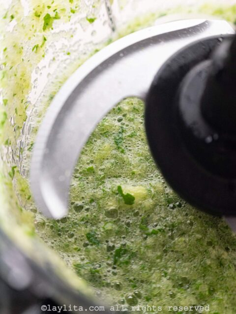 Close up of blended cucumber, lime, mint leaves and water
