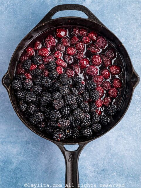 Add the rest of the blackberries to the skillet