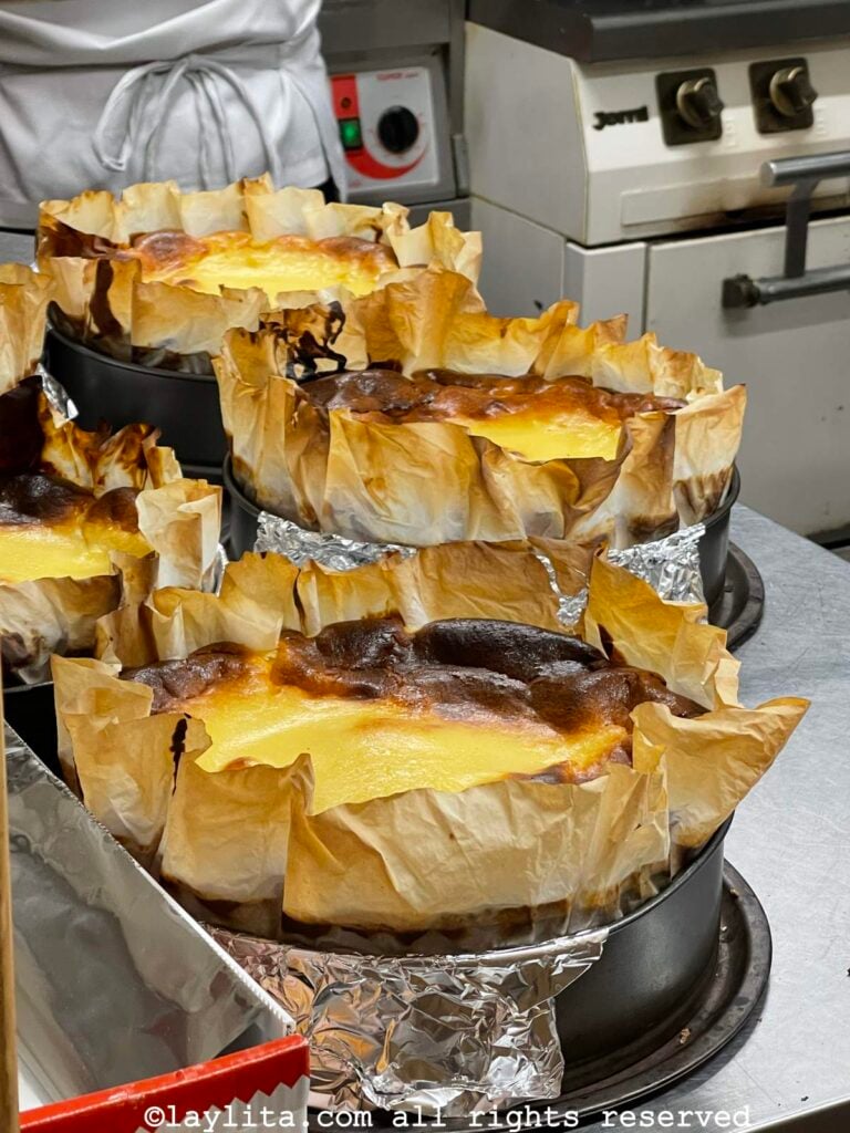Several Basque cheesecakes on a kitchen counter at La Viña restaurant in San Sebastian