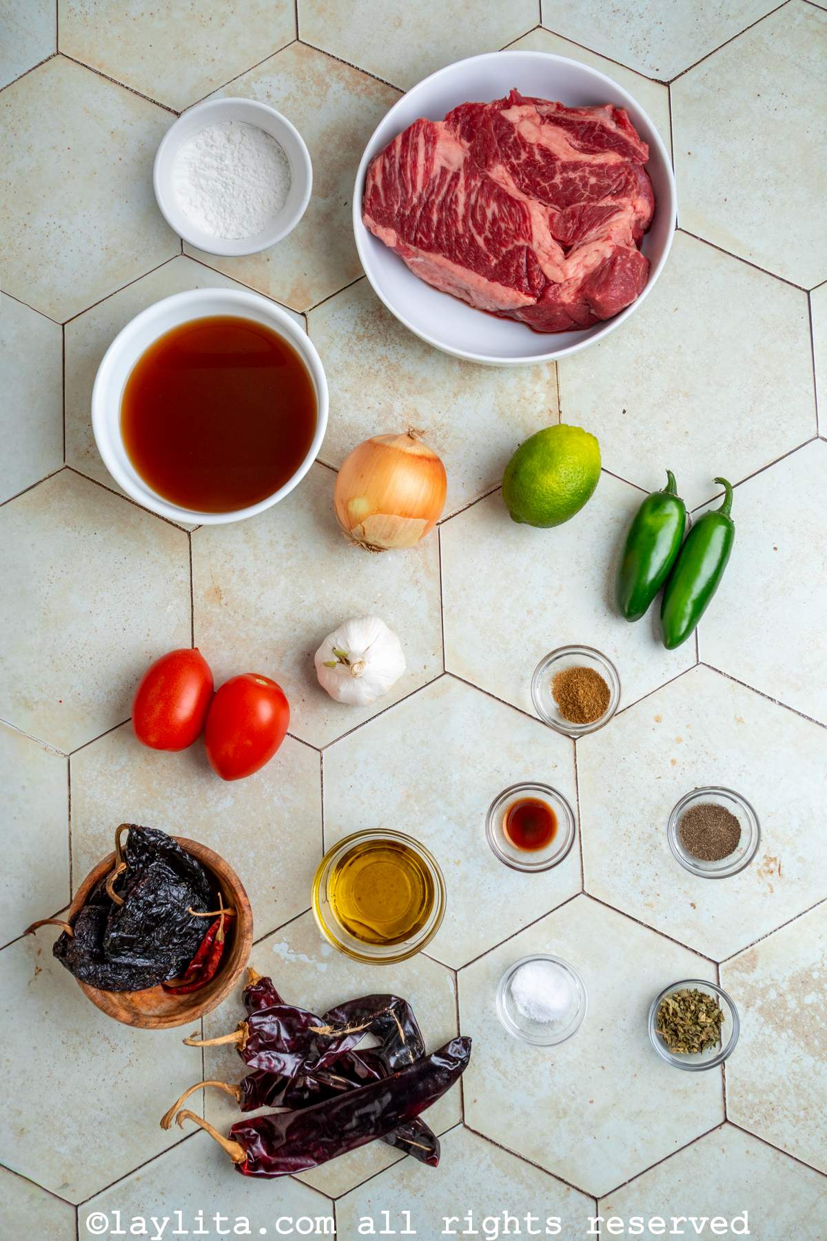 Ingredients for Beef Chili Colorado on a kitchen counter