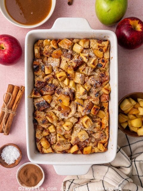 Overhead view of a white baking mold filled with apple bread pudding