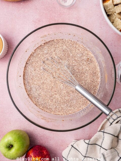In a large bowl, whisk together eggs, sugar, milk, heavy cream, cinnamon, nutmeg, salt, and vanilla. Whisk until the sugar is dissolved and the mixture is smooth.