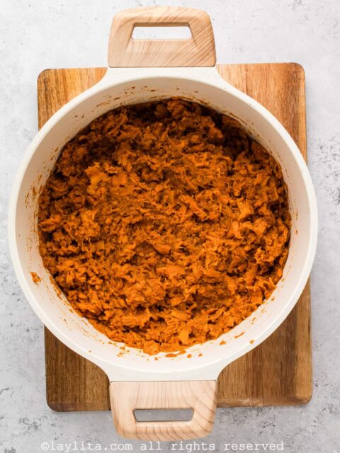 Spiced sweet potato filling for empanadas in a large pot
