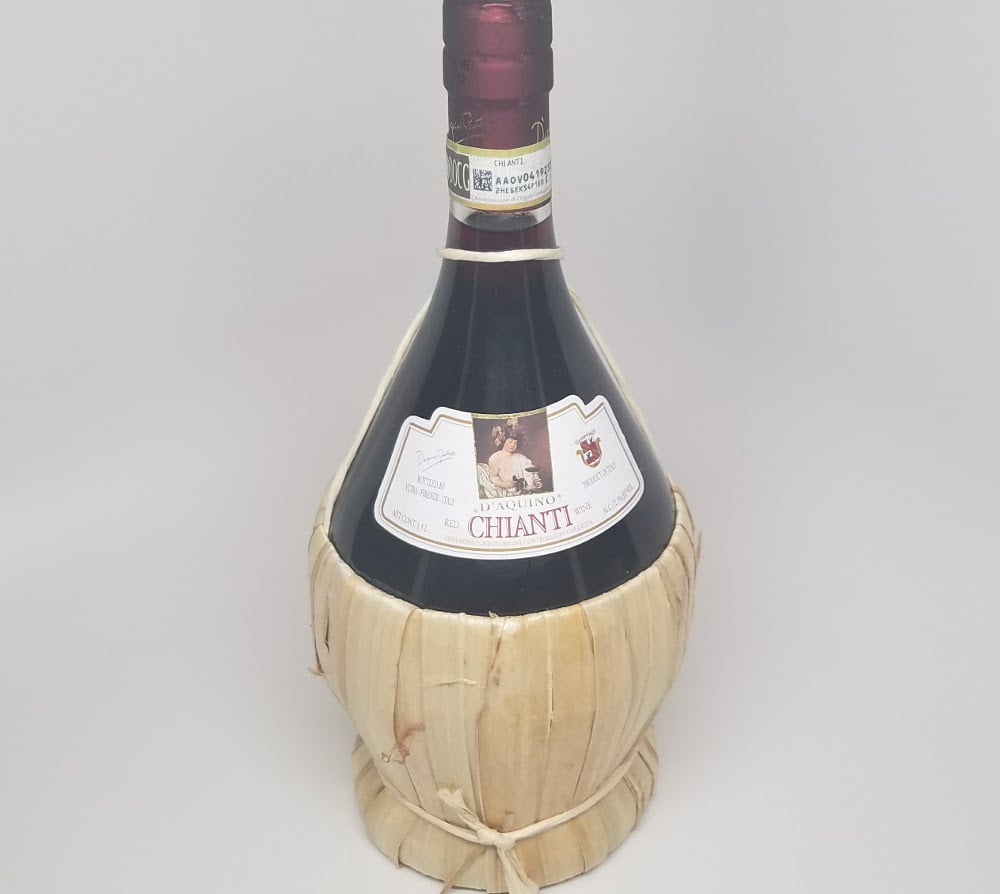 Traditional bottle of Chianti wine.